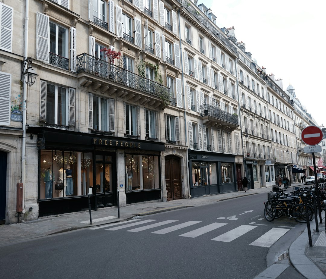 Street view of buildings with shops and parked bicycles